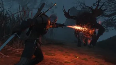 Geralt of Rivia casts a fiery spell at a horned monster in a dark forest.