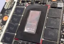 Close-up of an NVIDIA engineering sample GPU mounted on a circuit board with surrounding memory chips.
