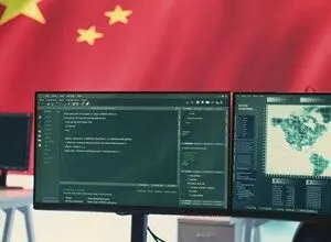 Computer monitors displaying lines of green code against a background of the Chinese flag.