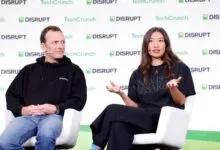 Jay Graber and another speaker on stage at TechCrunch Disrupt event