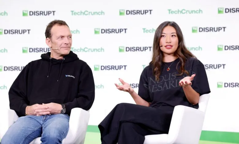 Jay Graber and another speaker on stage at TechCrunch Disrupt event