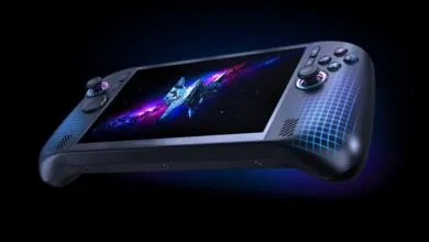 Acer Predator Atlas handheld gaming console glowing in dark with space wallpaper on screen