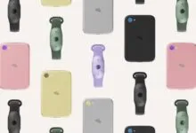 Collection of Humane Ai Pin devices and wearable bands in black, pink, yellow, green, silver, and purple