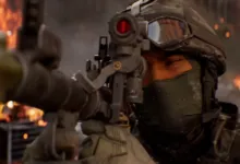 A soldier aims an assault rifle with a red dot sight amid chaos and fire.