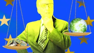 Bill Gates ponders next to scales balancing computer chips and a globe against a blue EU flag background.