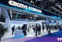 CXMT company exhibition booth featuring bright blue branding and displays at a tech convention