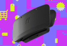 Black Fi smart dog collar tracker device against a vibrant pink, purple, and yellow shopping background.