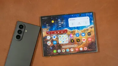 Samsung foldable smartphone showing vibrant home screen next to a phone with triple cameras.