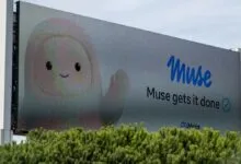 A large outdoor billboard displaying a Meta Muse advertisement with a cute character and the slogan Muse gets it done.
