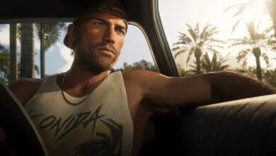 Jason Duval driving a car with palm trees visible outside the window in warm sunlight.