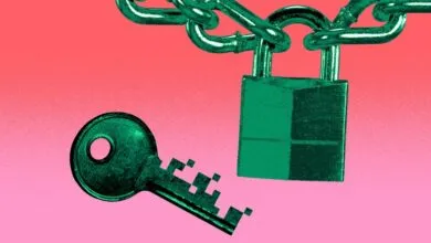 Green padlock hanging from a chain with a digital pixelated key below against a pink background