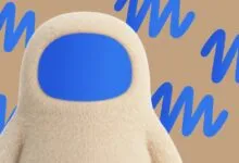 Fuzzy cream-colored character with a blue visor against a brown background with blue scribbles.