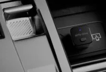 Twelve South AirFly Drive wireless transmitter plugged into a car's center console