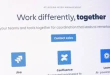 Atlassian Work Management landing page showing Jira, Confluence, and Loom tools.