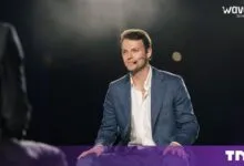 Alex Kendall, CEO of Wayve, seated on stage during an interview at the Wave by Vento event in Turin.