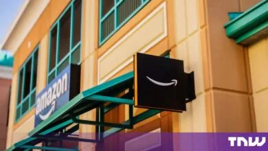 Amazon store facade featuring the iconic smile logo and text sign on a colorful building