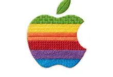 Embroidered classic rainbow Apple logo with textured colorful stitching on white background