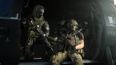 Tactical soldiers equipped with modern gear and rifles preparing inside a military transport vehicle.