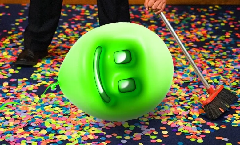 A person sweeping colorful confetti around a glowing green smiley face object.