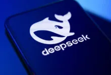 DeepSeek AI logo featuring a white whale icon and text displayed on a smartphone screen.