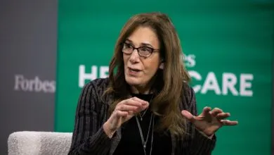 Executive and investor Dagmar Dolby speaks during a conference session with gestures.