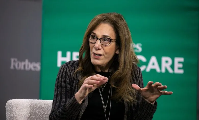Executive and investor Dagmar Dolby speaks during a conference session with gestures.