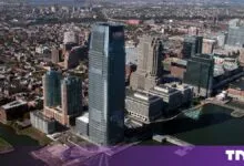 Aerial view of the Goldman Sachs Tower and surrounding skyline in Jersey City, New Jersey.