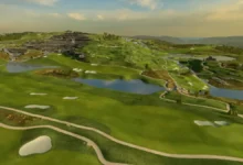 Aerial view of Payne's Valley golf course with rolling green fairways and water hazards.