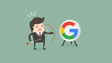 Businessman holding a bow and arrow, looking confused at a target with the Google logo.
