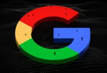Giant colorful Google G logo floating above a dark, textured landscape with tiny silhouetted figures walking on it.