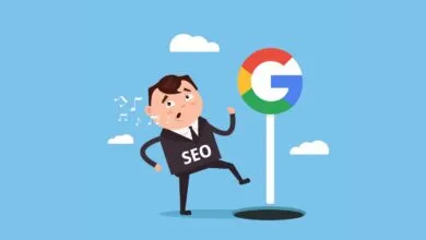 Animated businessman in suit labeled SEO dances next to Google sign