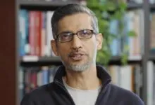 Google CEO Sundar Pichai speaks in front of a bookshelf