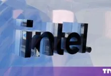 3D transparent glass Intel logo set against a reflective blue and white geometric background.