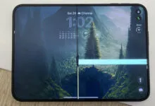 Foldable smartphone displaying a broken inner screen with a bright horizontal line defect.