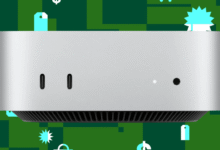 Front view of a silver Mac Studio computer against a green shopping-themed background