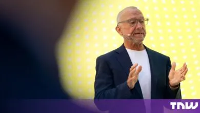 Marc Boroditsky, Nebius Chief Revenue Officer, speaking on stage with a yellow background.
