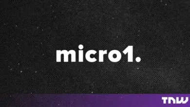 The white micro1 logo centered against a dark textured background with purple branding.
