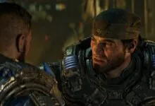 Close-up of a scarred soldier in heavy armor with a bandana talking to a comrade in a gritty setting.