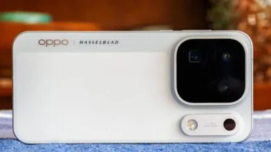 Back panel of white Oppo smartphone featuring Hasselblad branding and large camera module