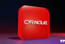 Glowing red 3D Oracle logo on a dark background with dramatic studio lighting