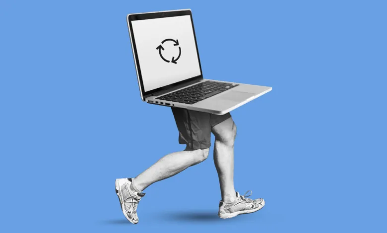 Laptop with running legs against a solid blue background