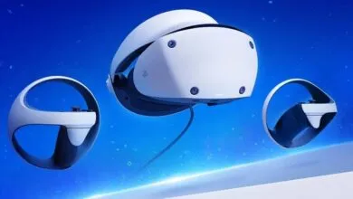 PlayStation VR2 headset and two white Sense controllers floating against a blue background