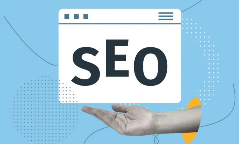 A human hand holds a browser window graphic displaying large bold SEO text on a light blue background.