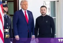 US President Donald Trump and Ukrainian President Volodymyr Zelensky stand together outside.