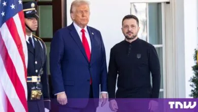US President Donald Trump and Ukrainian President Volodymyr Zelensky stand together outside.