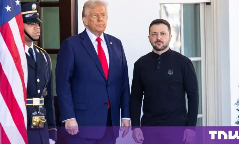 US President Donald Trump and Ukrainian President Volodymyr Zelensky stand together outside.
